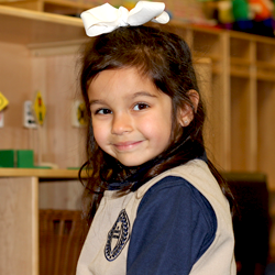 girl smiling in her uniform